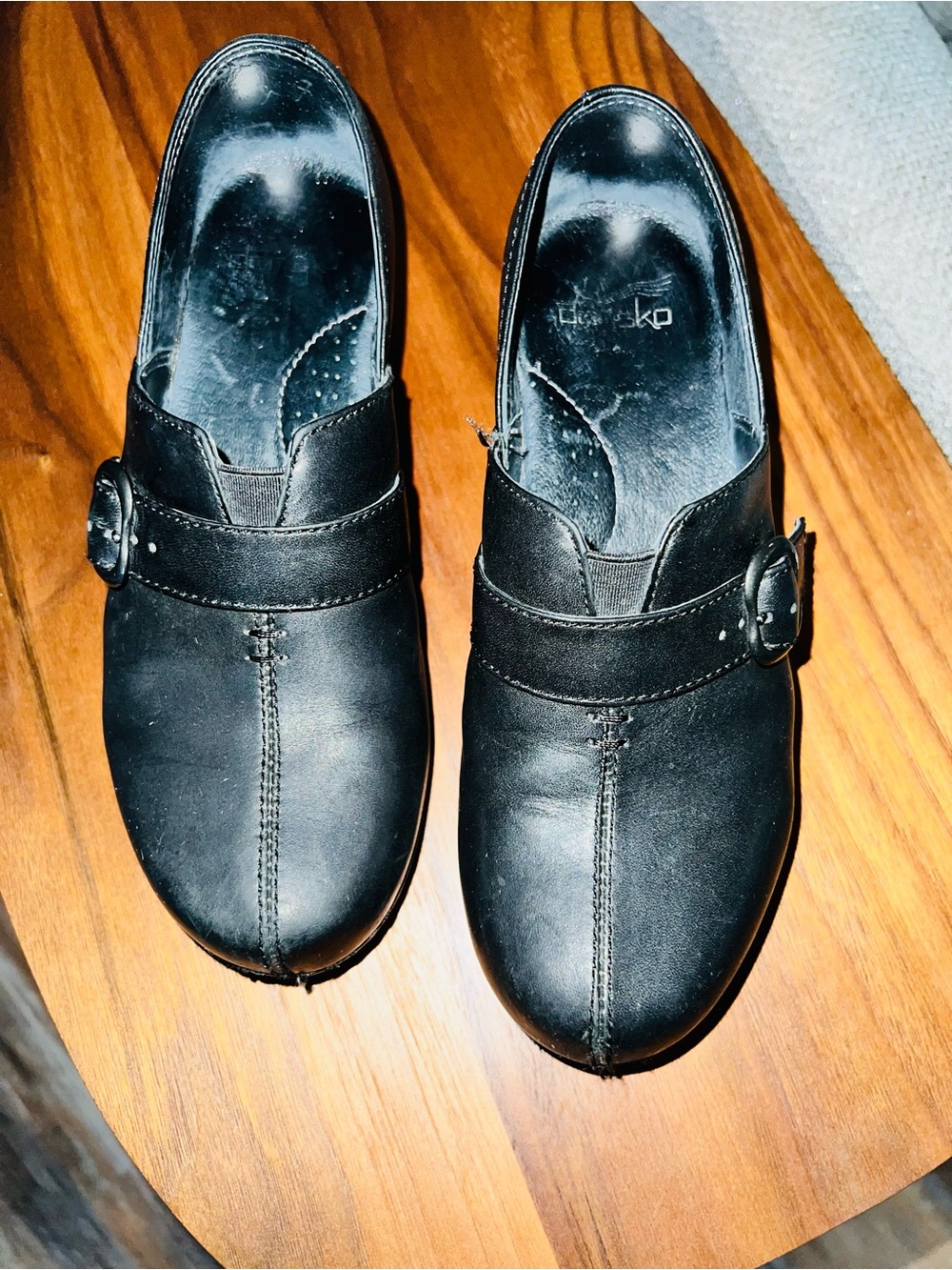 Dansko Black Women's Slip-On Mules with Side Buckle
